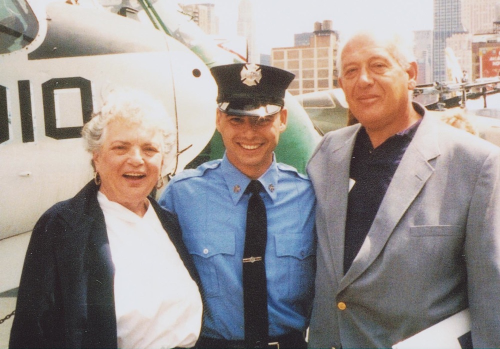 Newly appointed New York firefighter Jeffrey Palazzo stands with parents Irene and Anthony at his official induction ceremony. (Courtesy of the Palazzo Family)