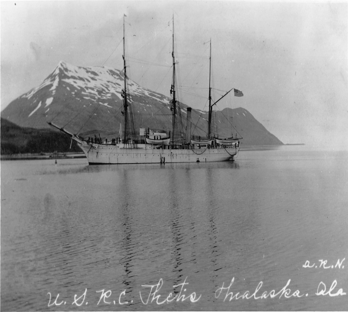 Revenue Cutter Thetis in white color scheme anchored at Unalaska Island Alaska prior to its Hawaiian deployments. (Navsource.org)