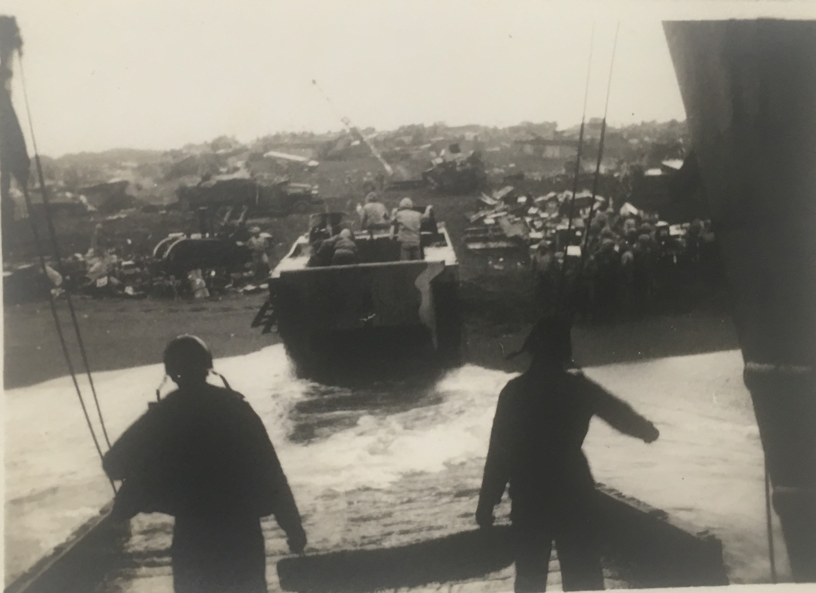 . A February 22, 1945, photo of a marine amtrac deploying from a Coast Guard LST onto the beachhead showing the fog of war and chaos on the landing beaches. (Courtesy Jack DiRosario)