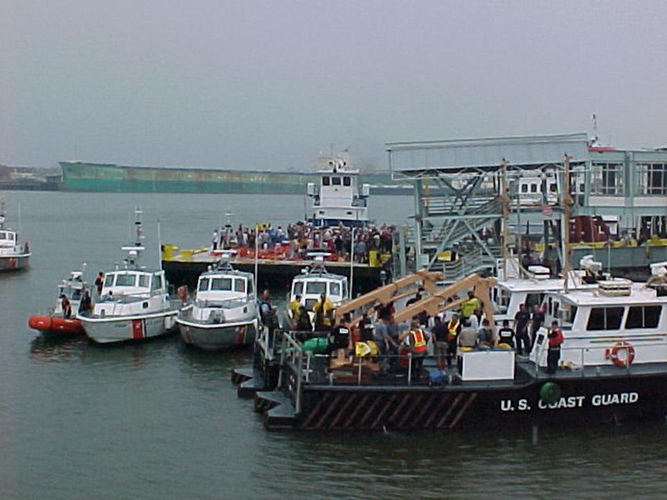 5.	Supervised by the Coast Guard, private barge operators begin evacuation of refugees from New Orleans to Algiers. (U.S. Coast Guard)