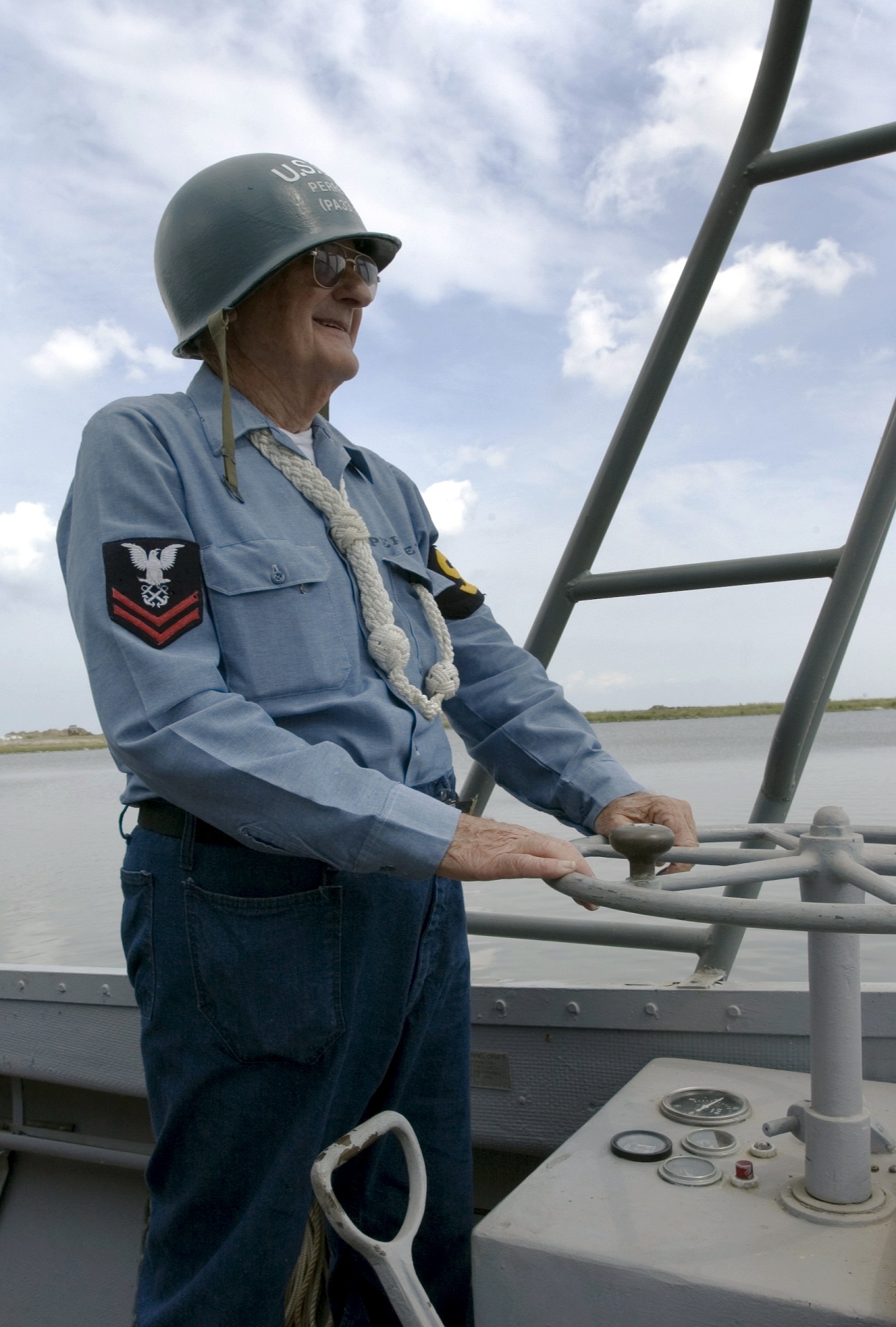 Marvin Perrett, at the wheel of his Landing Craft (LCVP) in New Orleans, provides passengers a taste of the World War II combat experience. (U.S. Coast Guard photo by Petty Officer 3rd Class NyxoLyno Cangemi)