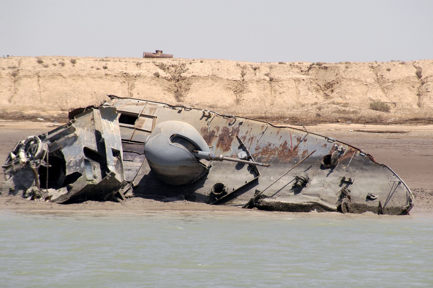 Wreck of an Iraqi patrol boat left along the Khor Abd Allah Waterway. (U.S. Coast Guard)