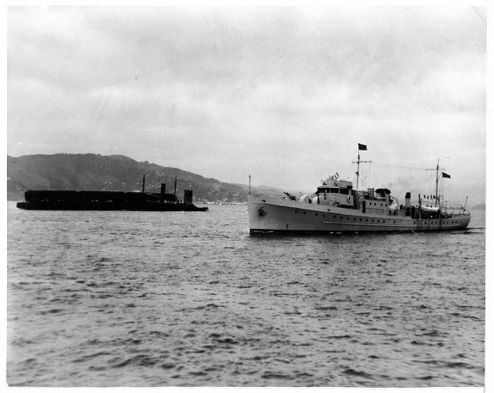 Image of U.S. Coast Guard Cutter Daphne is seen guarding the prison barge for Al Capone on its short voyage to Alcatraz, 1934. (myalcaponemuseum.com)