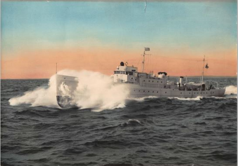 A colorized photograph depicting Daphne sistercutter Thetis underway in moderate swell. (U.S. Coast Guard Photo)